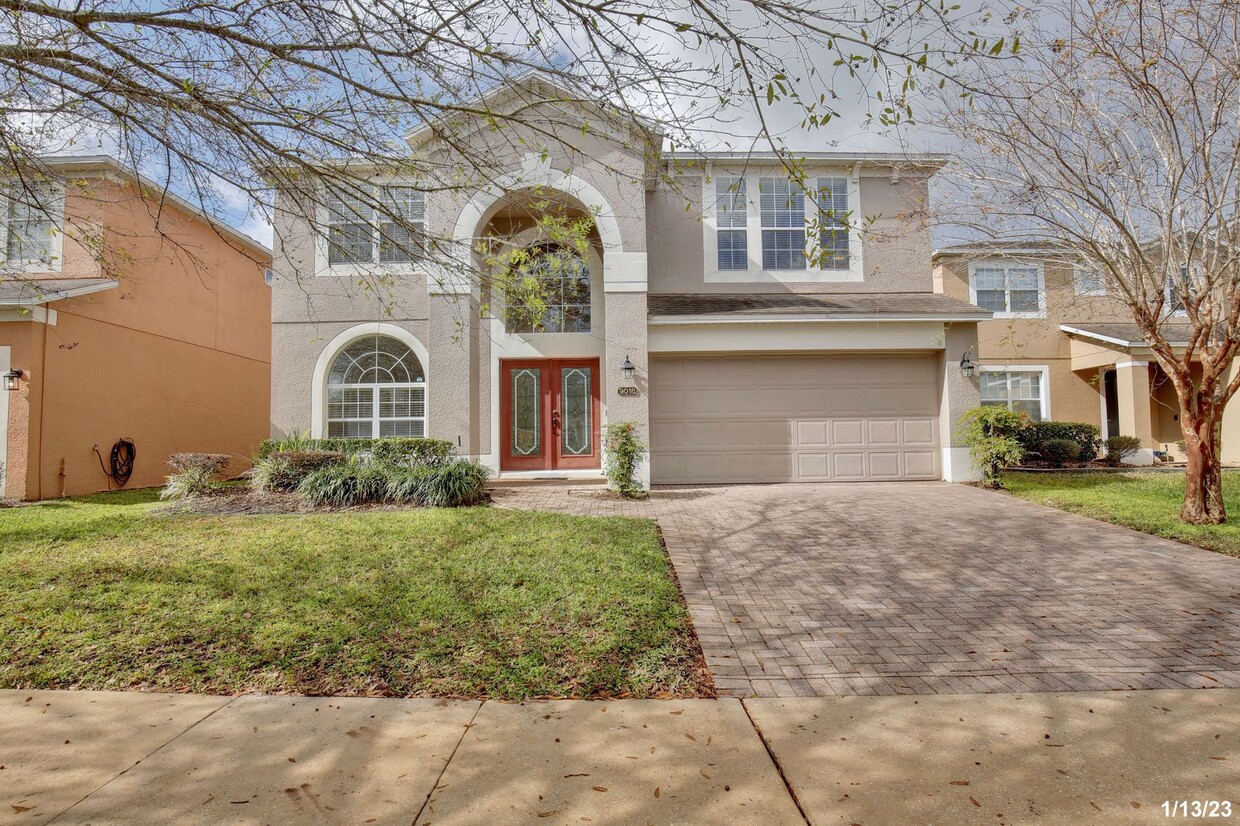 Foto principal - Stunning 4/2.5 Home with a Large Fenced Ba...