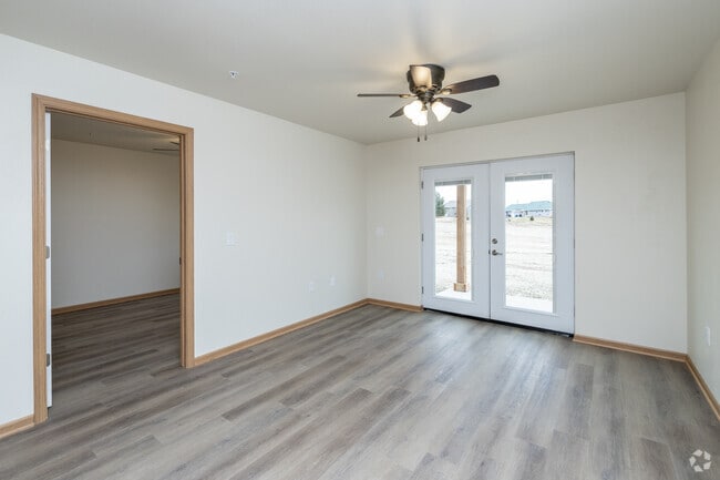 3BR, 2BA - Living Room - Meadowlark Eco Apartments