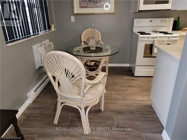 Building Photo - 11 Woodman Dr S