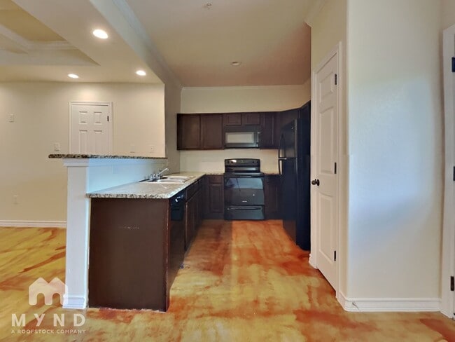 Building Photo - 6415 Melanzane Ave