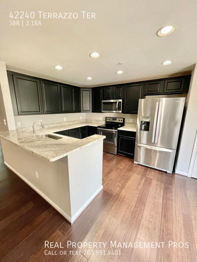 Building Photo - Coming soon-Townhome style condo, with gar...