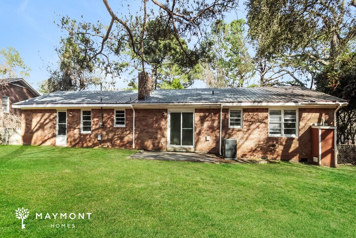 Foto del edificio - Charming 4-Bedroom Brick Home