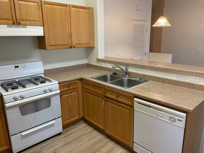 Building Photo - Gated two bedroom SW unit with garage