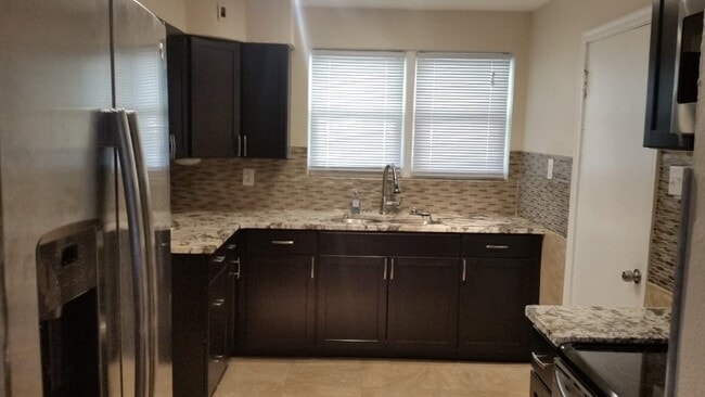 Building Photo - 8837 Granada Pl