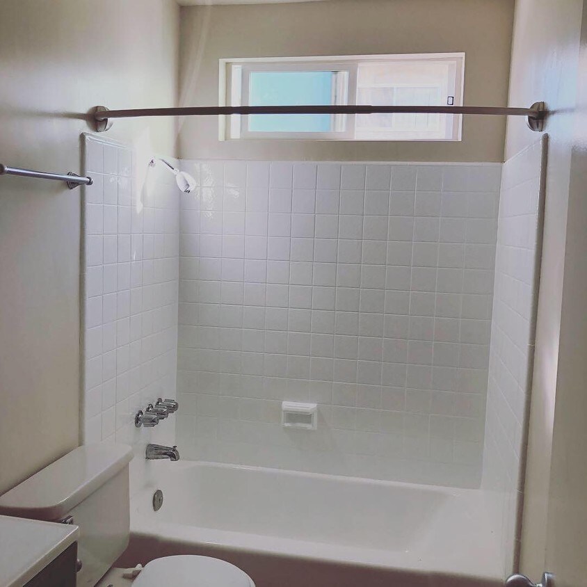 New stall wall and tub - 8120 Owensmouth Ave