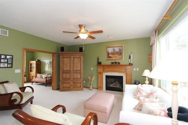 beautiful living room with gas fireplace - 765 Breconshire Ln
