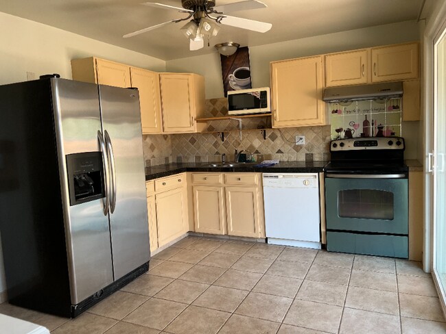 Building Photo - 6668 S Garland Way