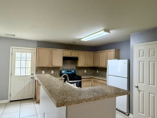 Foto del edificio - 9214 Purston Ct