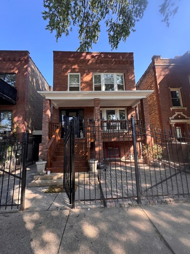 Building Photo - 7337 N Honore St