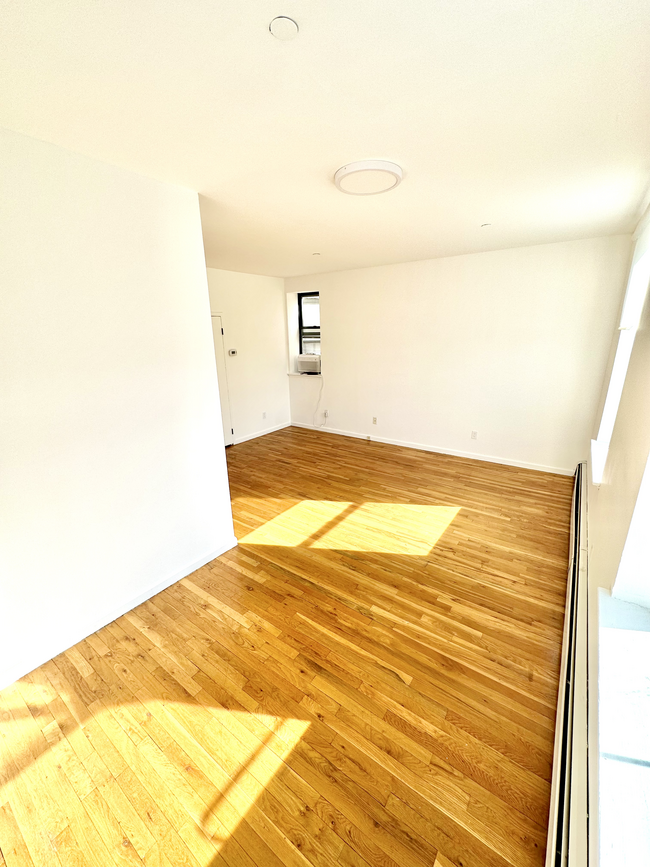 Living Room / Dining Area - 2322 Adam Clayton Powell Jr Blvd