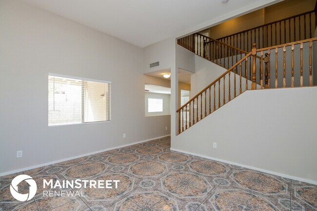 Building Photo - 8341 W Hughes Dr