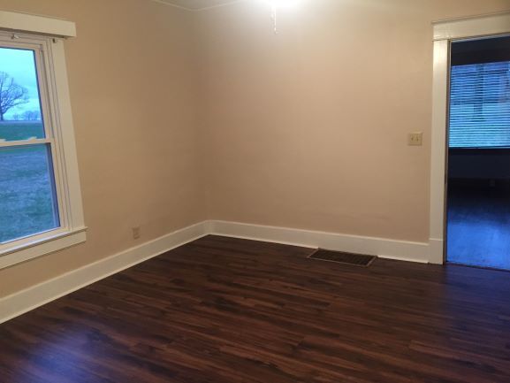 Bedroom with door to living room - 4450 Homer Worsham Rd