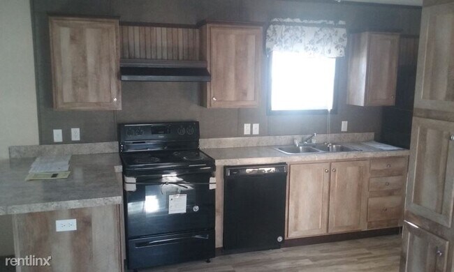 Foto del edificio - 3 br, 2 bath Mobile Home - 819 N 32nd St