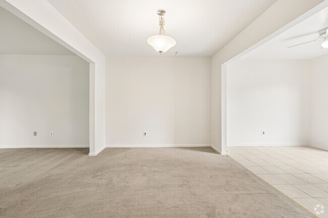 2BR, 1BA w/ Balcony - 1,230SF - Dining Room - Carriage Run Apartments & Townhomes
