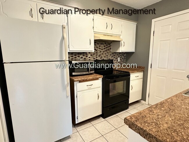 Building Photo - Brooklyn Park End Unit Patio Home, Dishwas...
