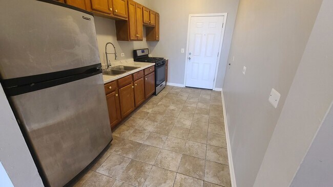 Foto del edificio - 1409 E 69th Pl