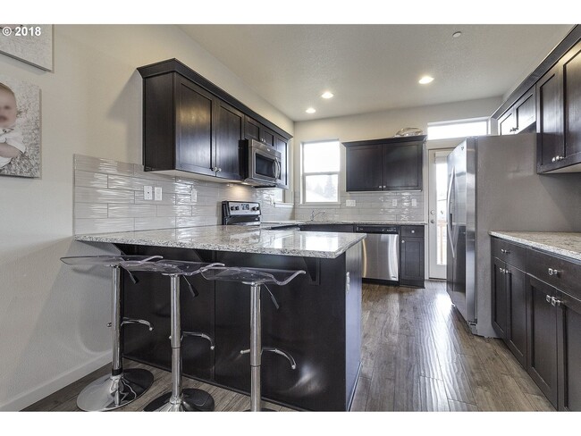 Building Photo - Wonderful 3 Bedroom + 2.5 Bath Townhome in...