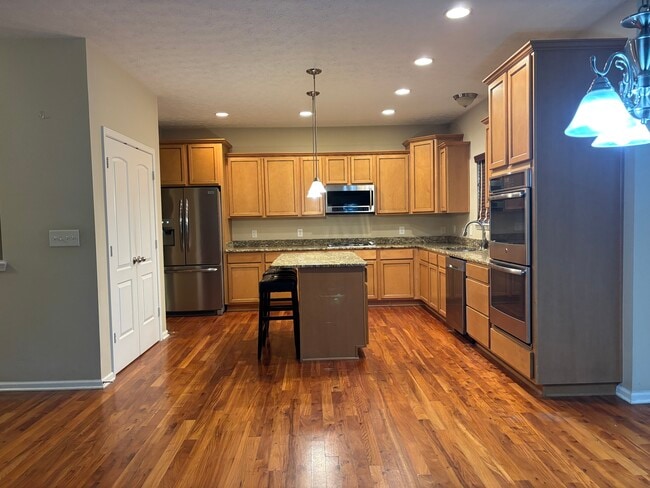 Kitchen w/Island - 6648 Wilmot Ln