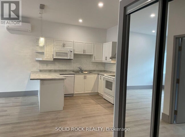 Photo du bâtiment - 48 King St E