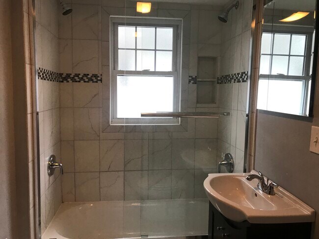 Custom updated bathroom with double shower heads - 9 Coniston Rd