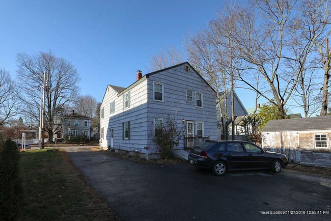 Back parking lot. - 16 Elm St