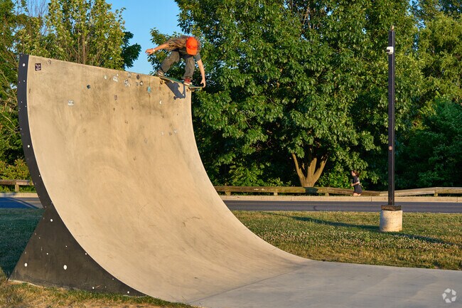 A skater drops in on the vert ramp in Fairgrounds Park.