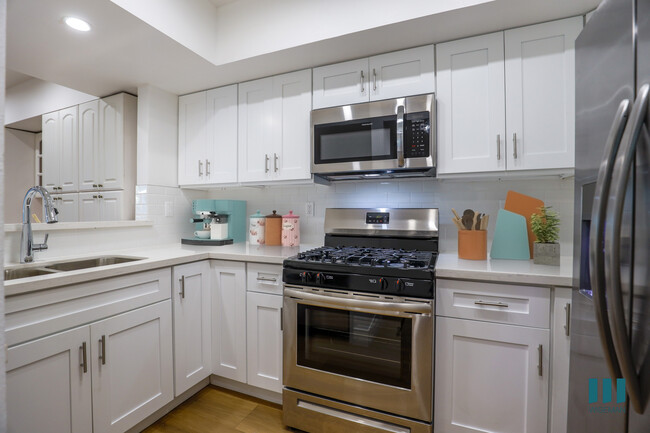 Kitchen with Stainless-Steel Appliances - Ohio Rose Apartments