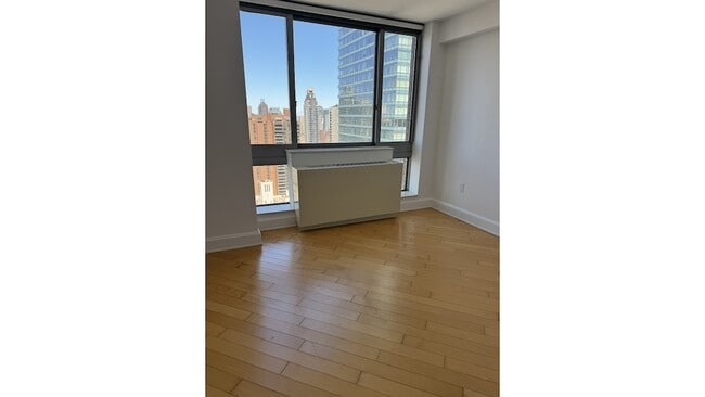 Foto del edificio - 231-235 E 55th St