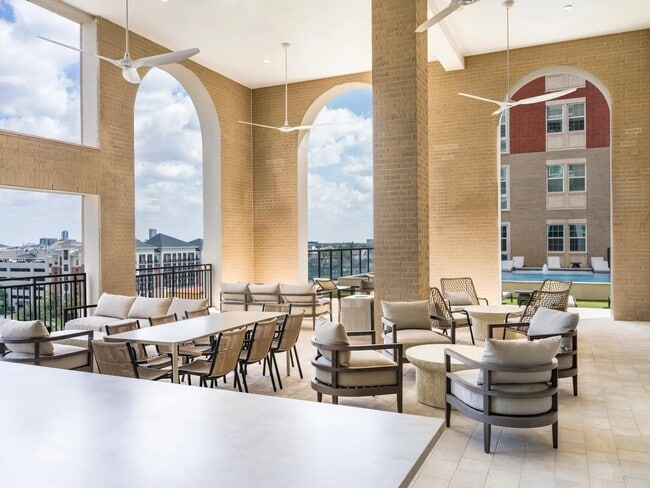 Bask in the Houston sunshine on Modera Waugh’s expansive sundeck, just steps from the pool. - Modera Waugh