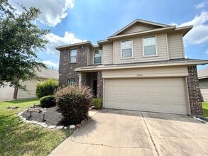 Building Photo - 10831 Woodwind Shadows Dr