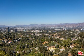 Building Photo - 7177 Pacific View Dr