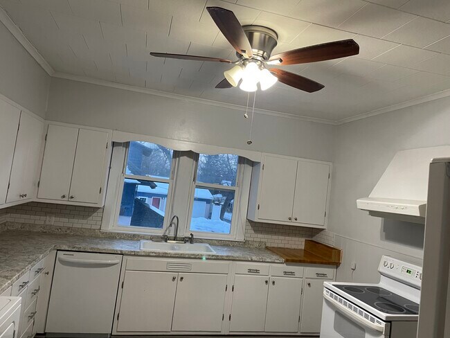 Kitchen includes washer and dryer - 145 Stewart St