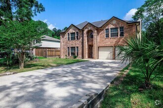 Building Photo - 6902 Woodland Oaks