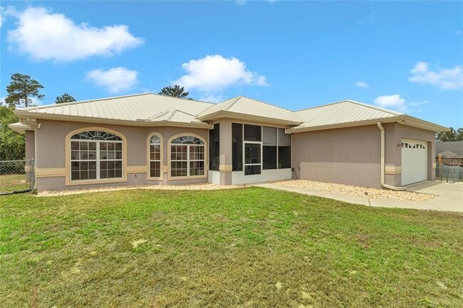 Building Photo - 10372 SW 41st Ct