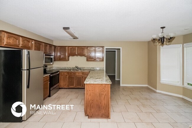 Foto del edificio - 8866 Forest Ridge Cove