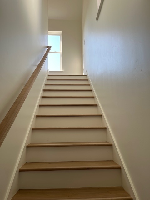 Stairs up to the living area and bedroom - 1449 Olive St