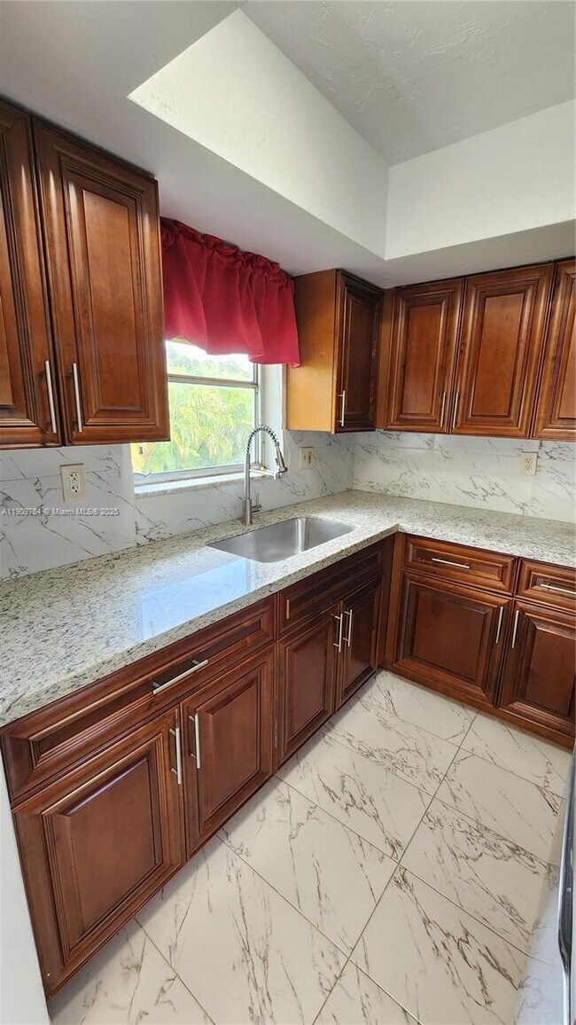 Foto del edificio - 3090 Coral Springs Dr