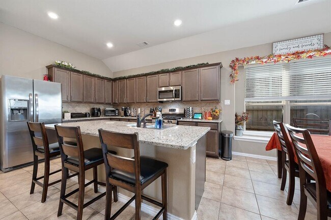 Foto del edificio - 8807 Harvest River Dr