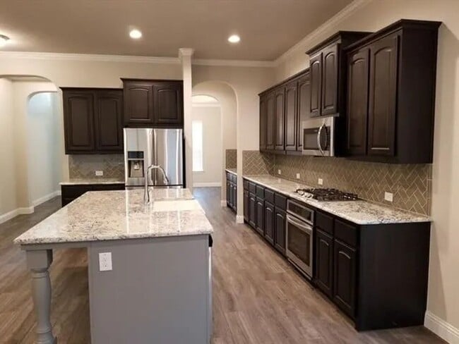 Building Photo - Coming Soon! 4BR/3.5BA | Updated Single Family Home | 2-Car Garage Parking | Fenced backyard
