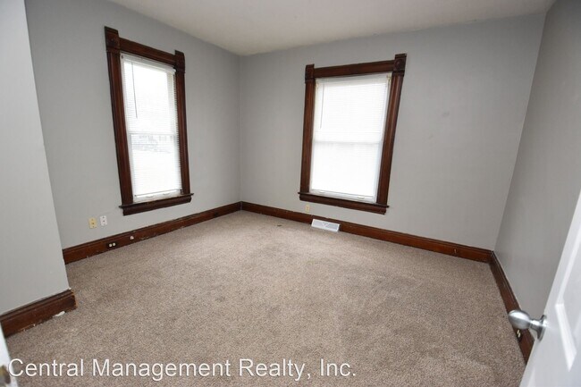 Building Photo - 4 br, 2 bath House - 207 E 7th St