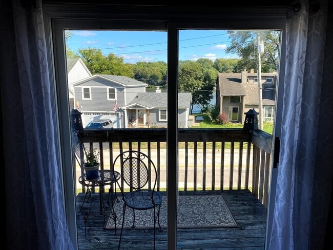 Master balcony overlooks the Fox River - 518 N Harrison St