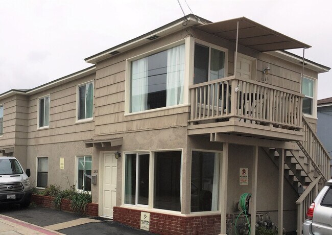 Second story, second building from ocean front - 3361 Strandway