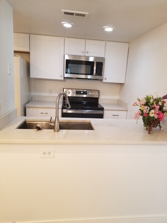 Kitchen with new Range & Microware - 6475 S Dayton St