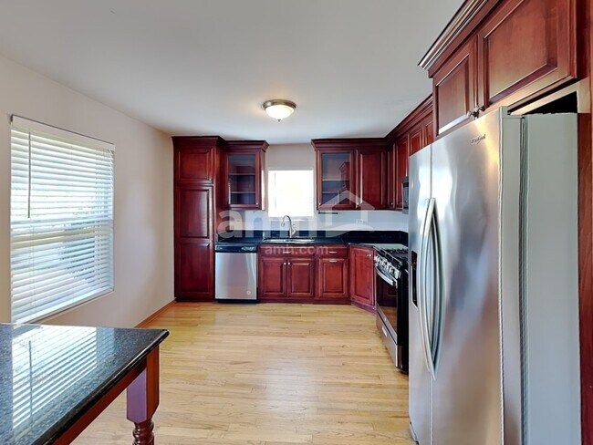 Foto del edificio - 5209 Sunmeadow Dr