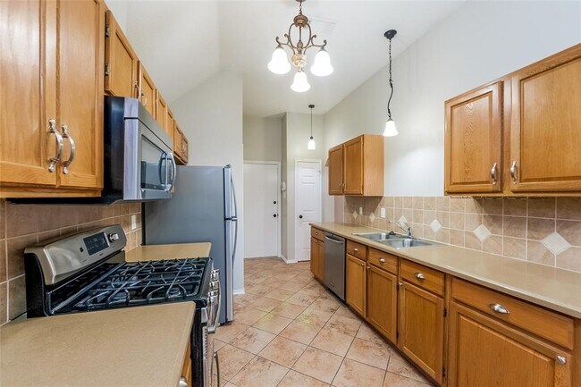 Foto del edificio - 5915 Woodmancote Dr