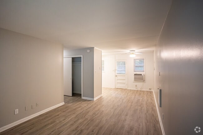 1BR, 1BA - 700SF - Living Room - Poplar Village