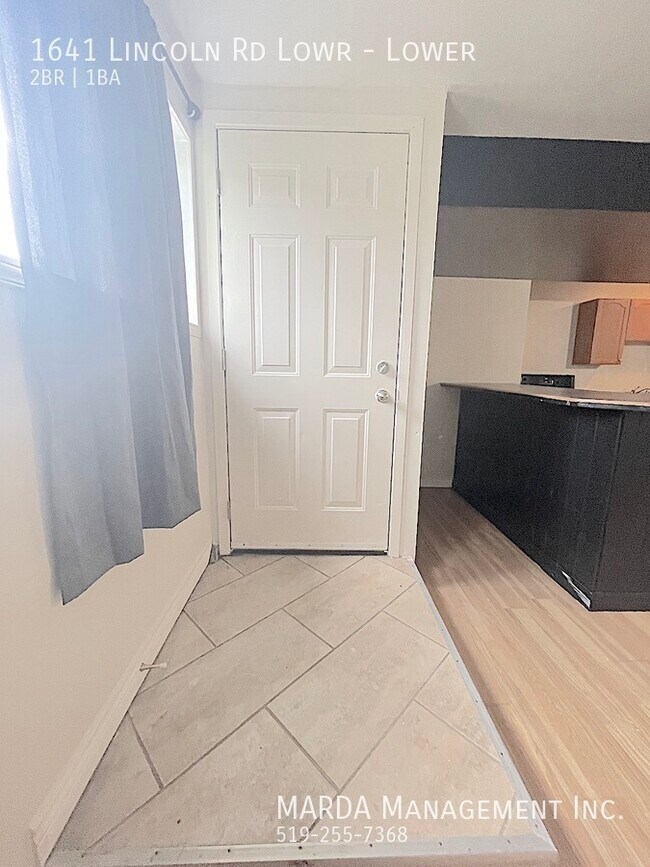 Photo du bâtiment - COZY OPEN CONCEPT 2 BED/1 BATH LOWER UNIT ...