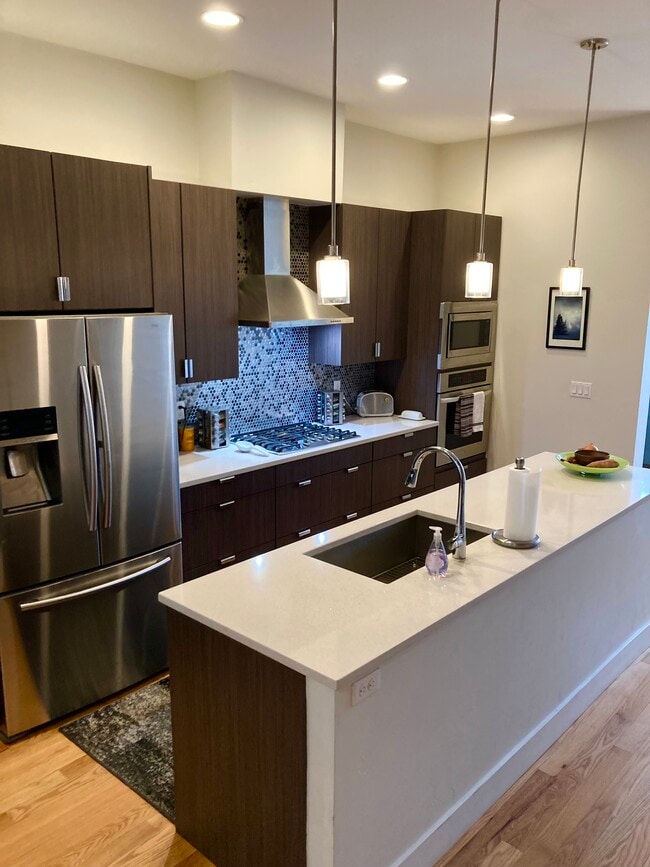 Gas range, French door fridge with ice/water dispenser - 2153 N Downing St