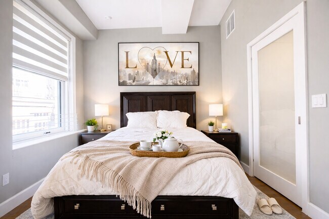 Dormitorio de la suite Skyline - HW Hellman Building