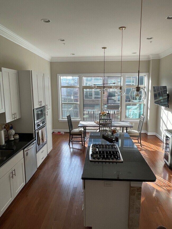 Kitchen and Dining Area with Balcony - 127 W Fort Ave